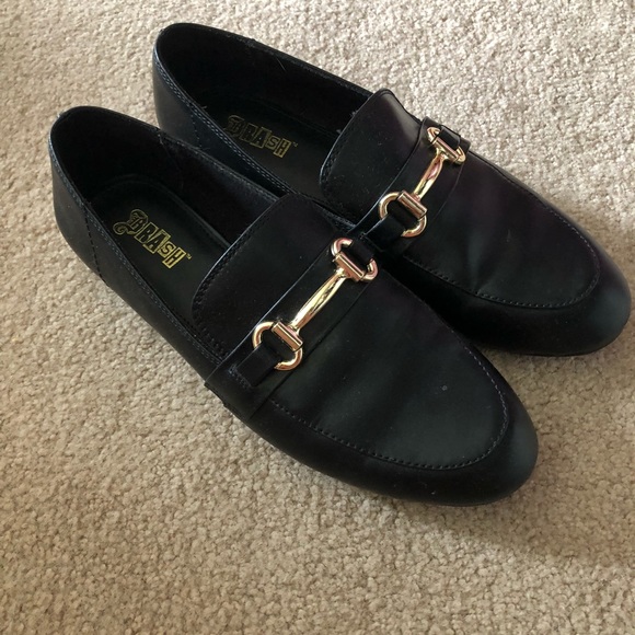 black loafers with gold